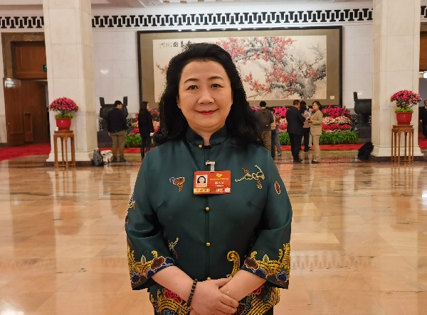 以法治护航民族团结 用音符共筑共同体——访全国政协委员娜木拉